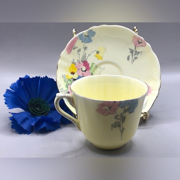 Crown Staffordshire Teacup & Saucer Pale Yellow w/Blue, Pink, and Yellow Flowers - Picture 10 of 10